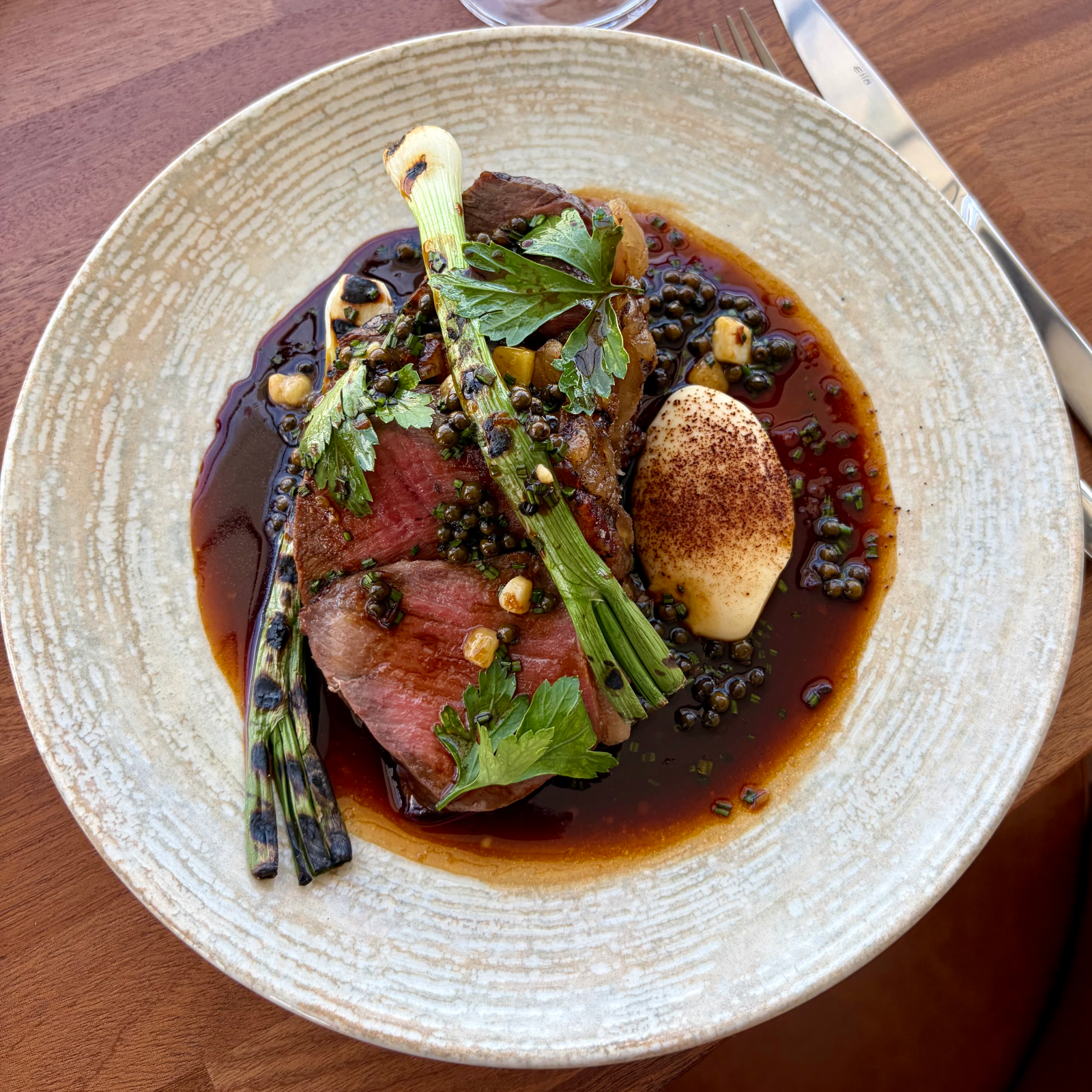 Trenchmore wagyu sirloin, bone marrow peppercorn sauce, parsley root