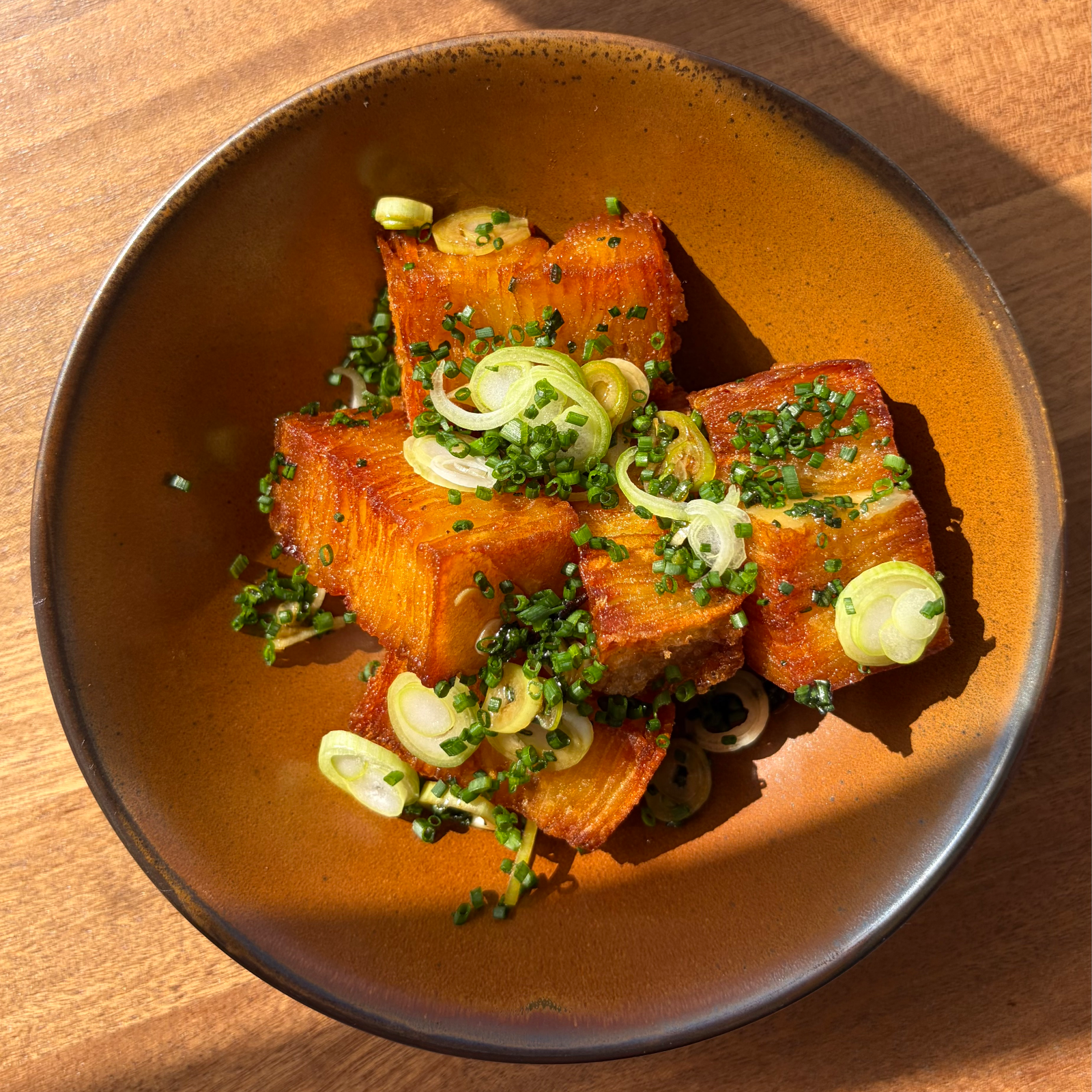 Confit potato, garlic aioli, tare